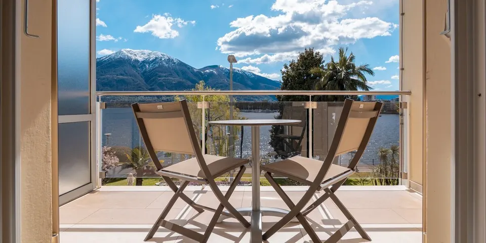 Chambre double supérieure avec vue sur le lac — Hotel La Palma au Lac