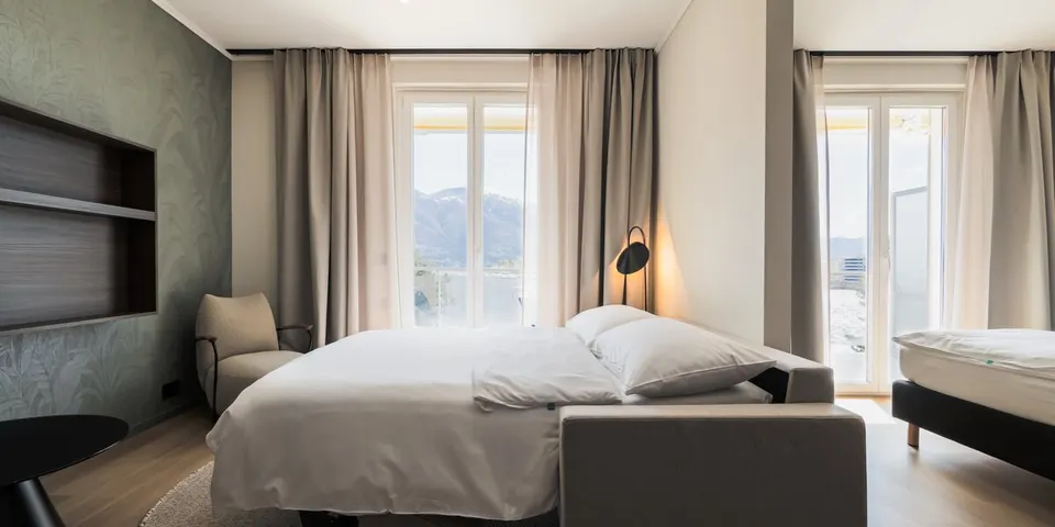 Suite avec vue sur le lac — Hotel La Palma au Lac